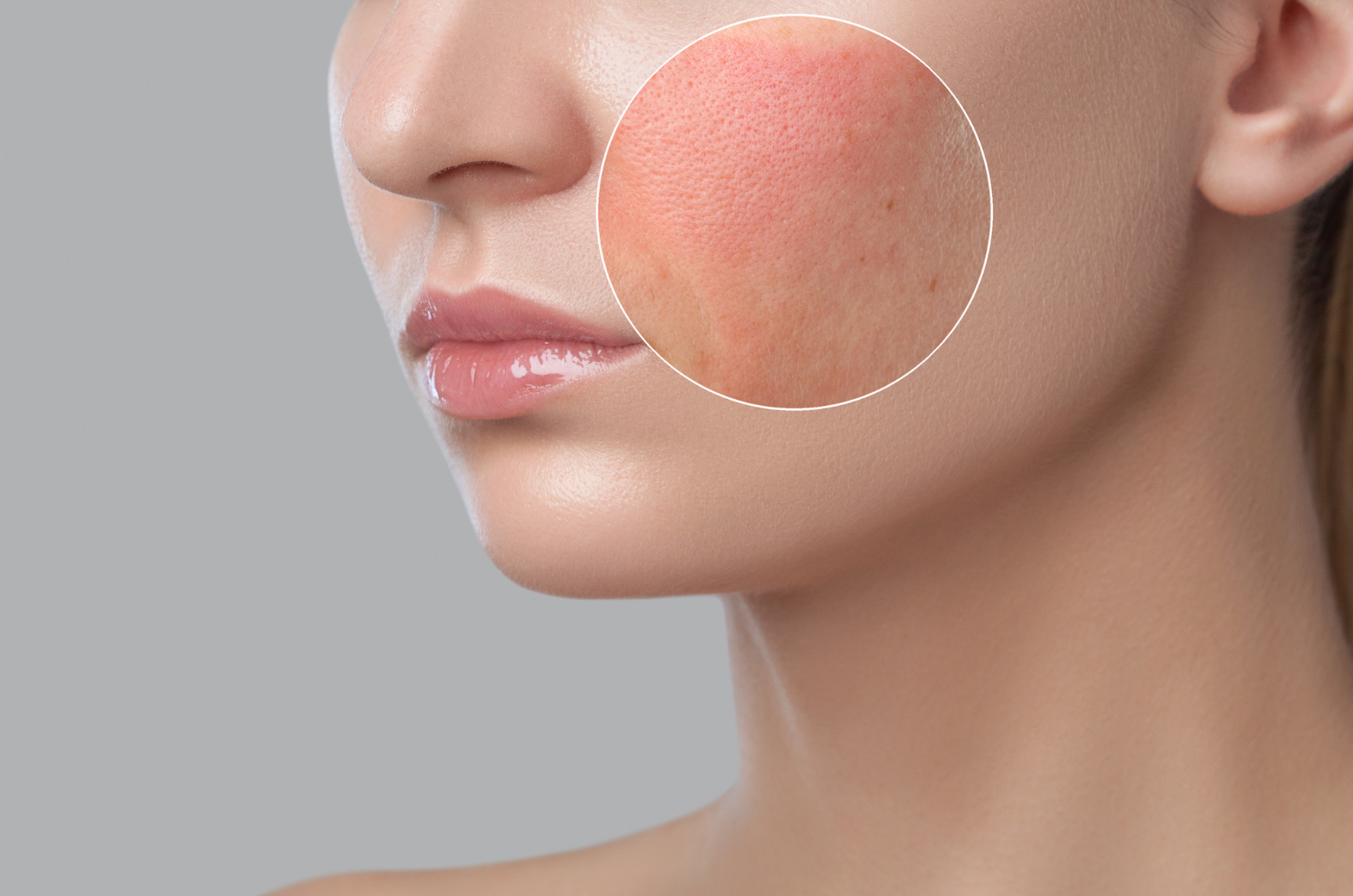 Woman using microcurrent facial device at home for skin tightening and anti-aging results.