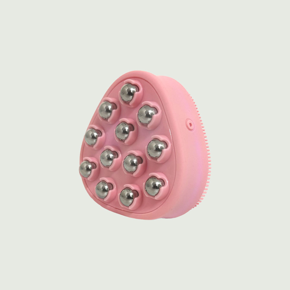 Back view of the pink PurePulse Pro Sonic Cleansing Brush featuring 12 rounded metal massage nodes, designed for facial toning and improved blood circulation.