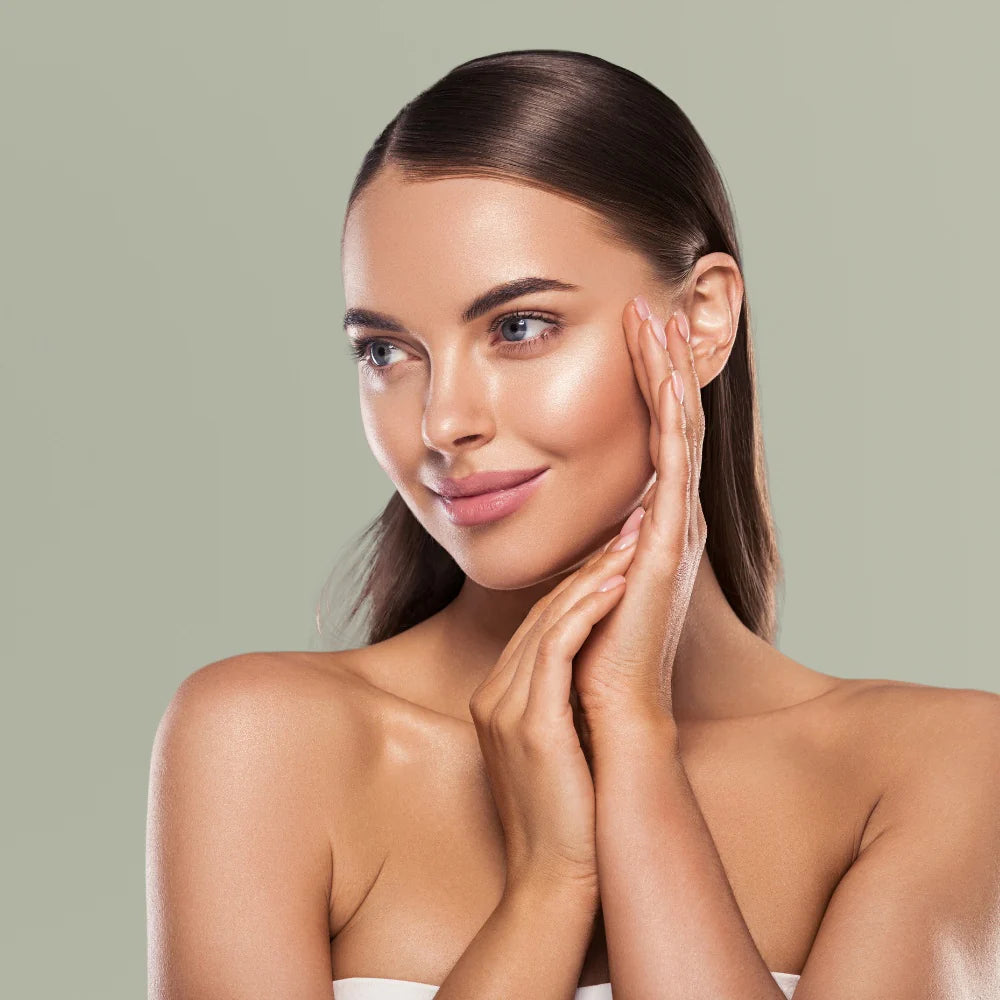 Woman with glowing, clear skin smiling naturally, showing the healthy and refreshed look achieved after using the pore cleanser with heating for deep pore cleaning.