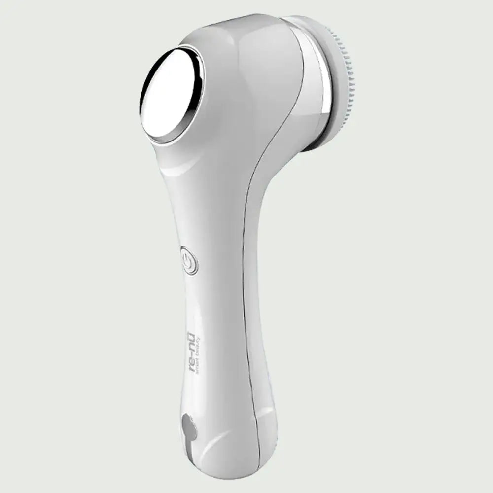 Back view of PureSpin Facial Cleansing Brush with EMS showing curved design and control panel