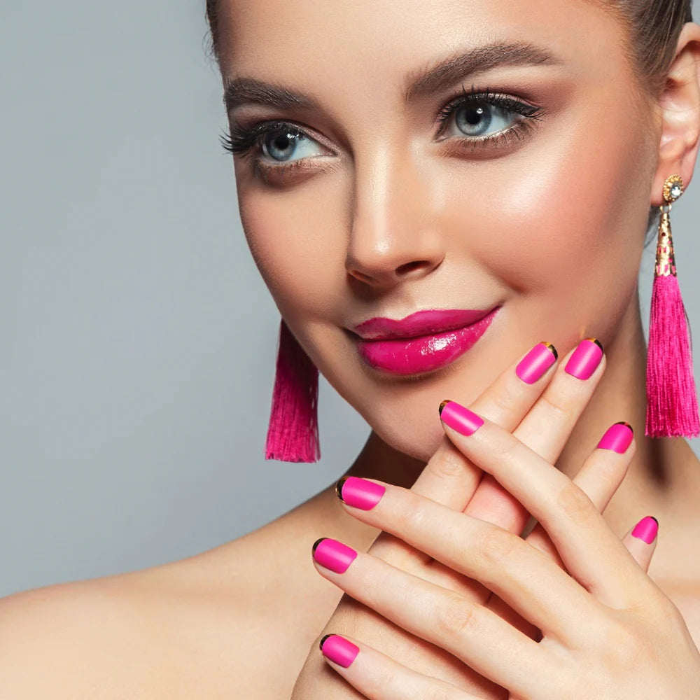 Woman displaying freshly trimmed and painted nails after using Electric Mini Nail Clipper