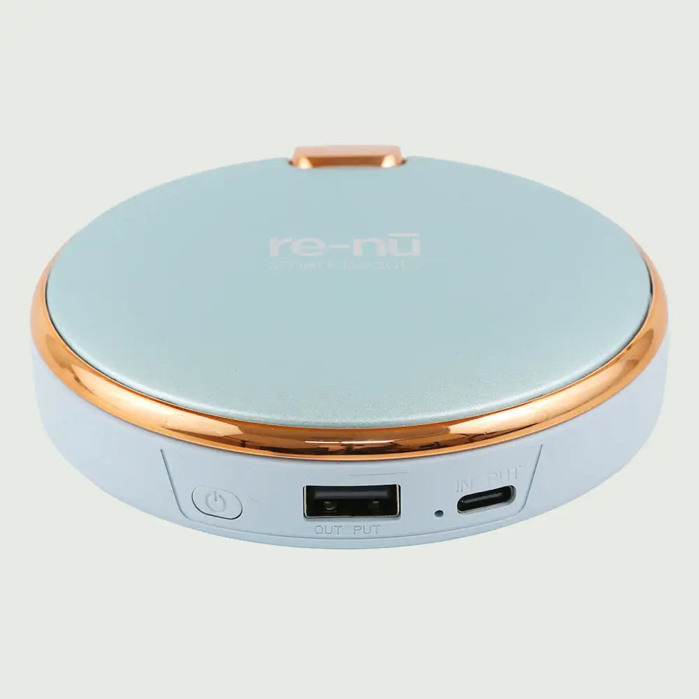 re-nū Smart Beauty 3-in-1 Rechargeable Hand Warmer & Power Bank – compact aluminum design in Blue finish.
