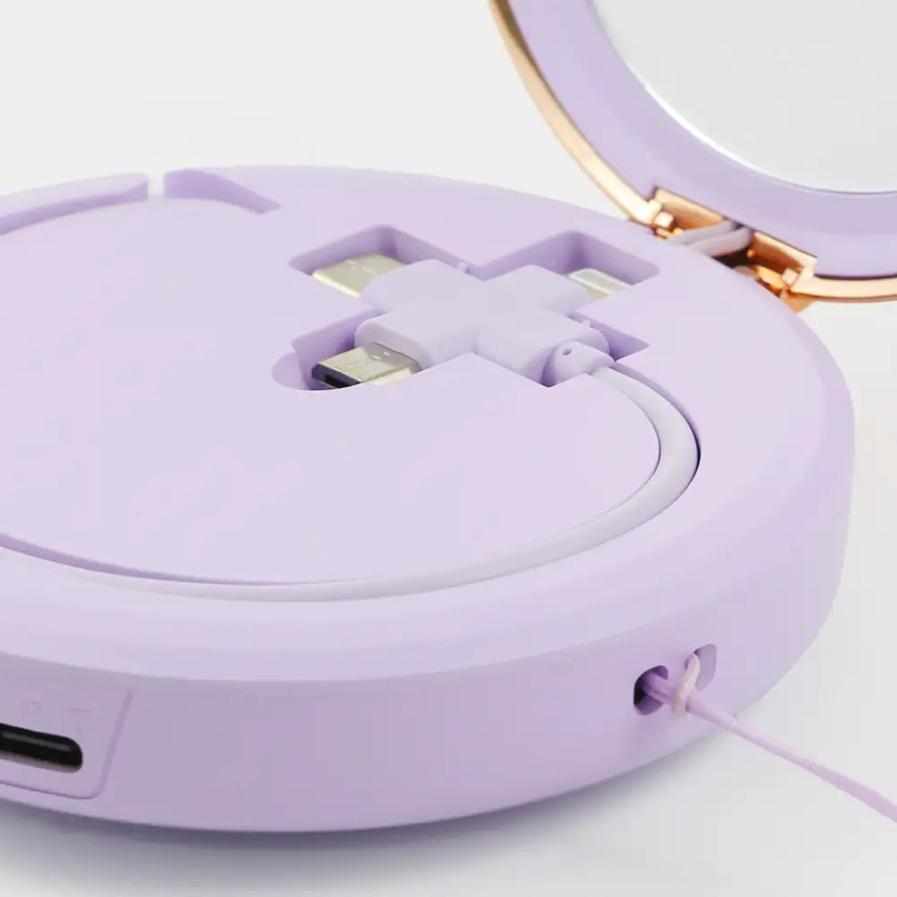 Close-up of the re-nū 3-in-1 Hand Warmer highlighting the included multi-connector cable for fast power bank charging.