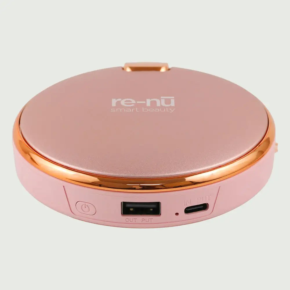 re-nū Smart Beauty 3-in-1 Rechargeable Hand Warmer & Power Bank – compact aluminum design in Pink finish.