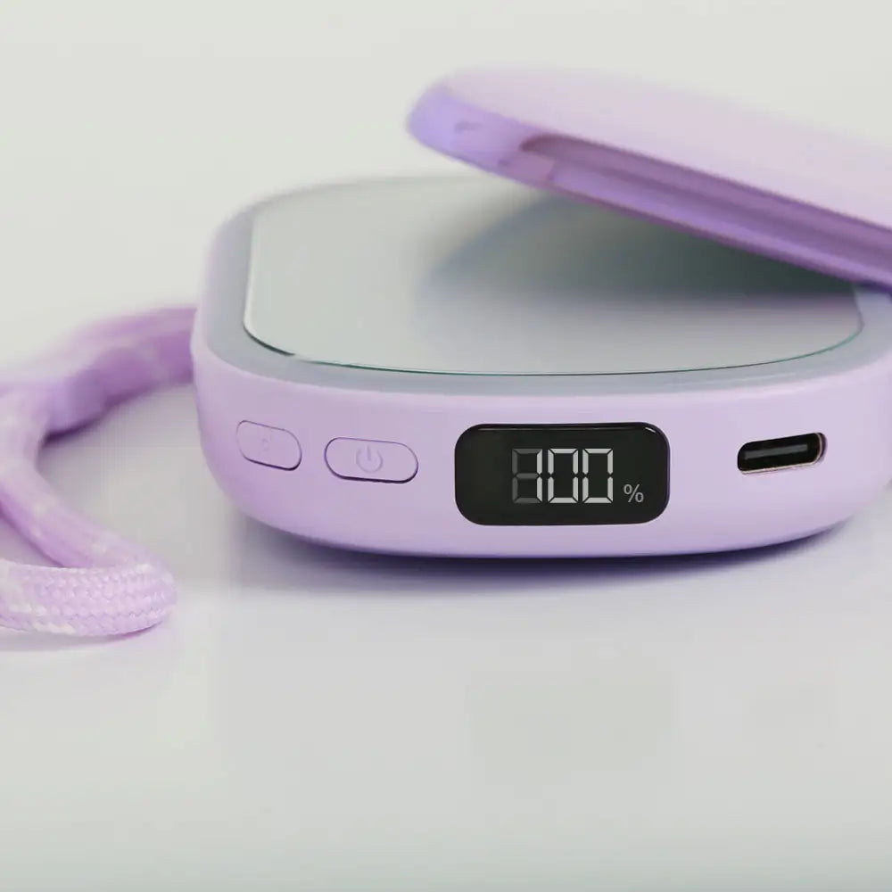 Digital battery display of the re-nū 4-in-1 LED Compact Mirror with Power Bank and Hand Warmer, showing remaining power, Purple version