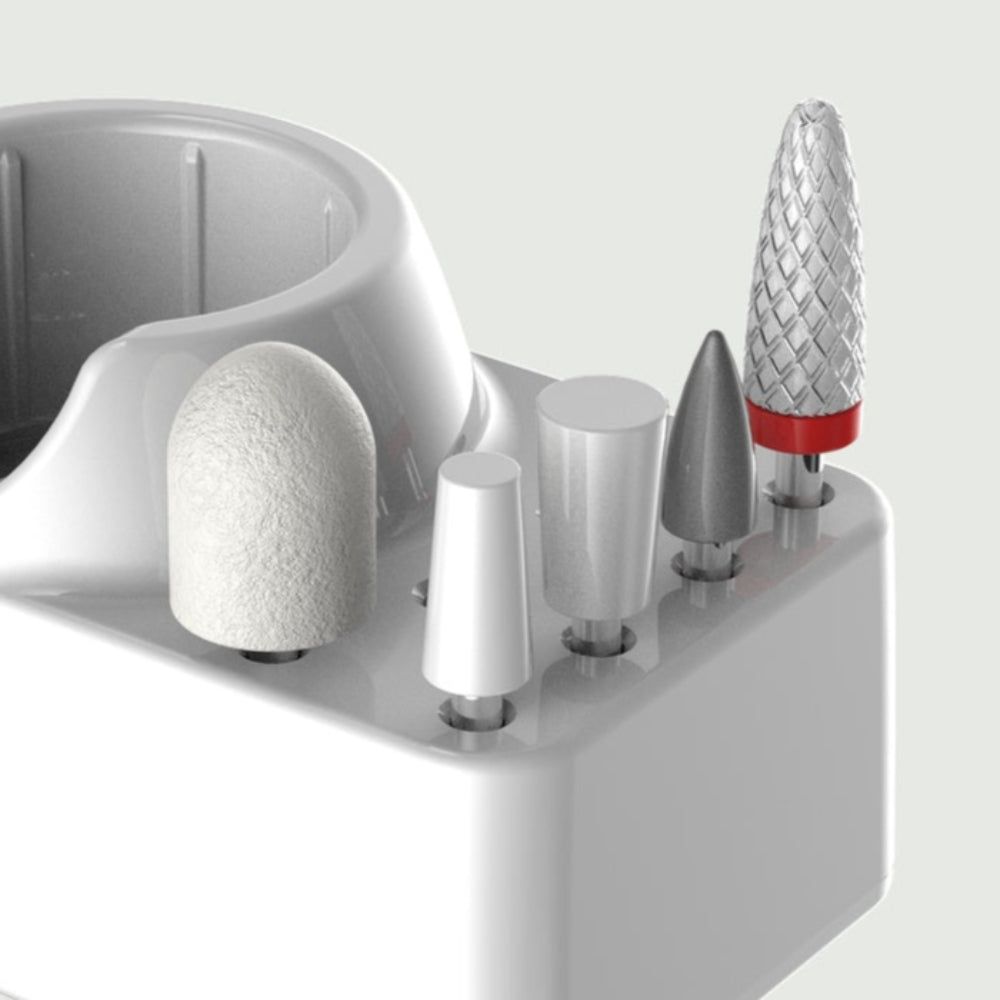 Detailed view of manicure drill heads including filing and buffing tips