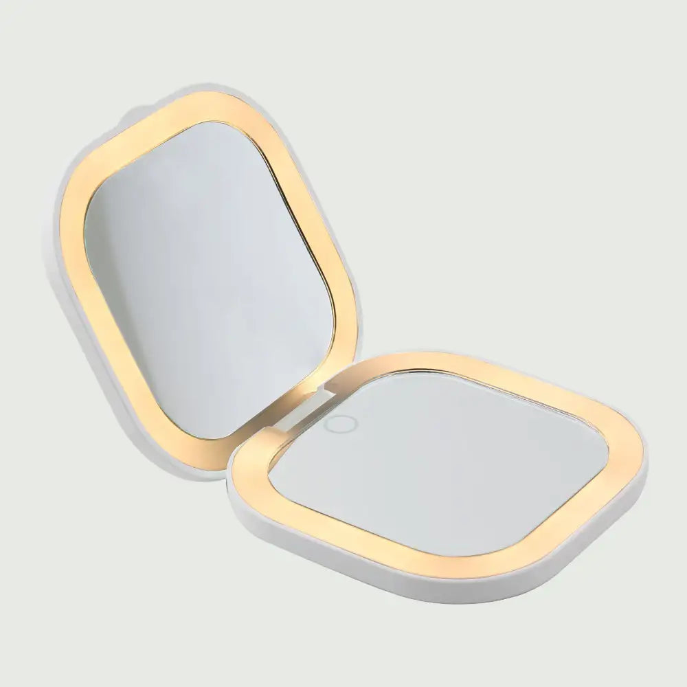 The Compact LED Pocket Mirror opened with bright, natural LED lights illuminating for enhanced visibility.