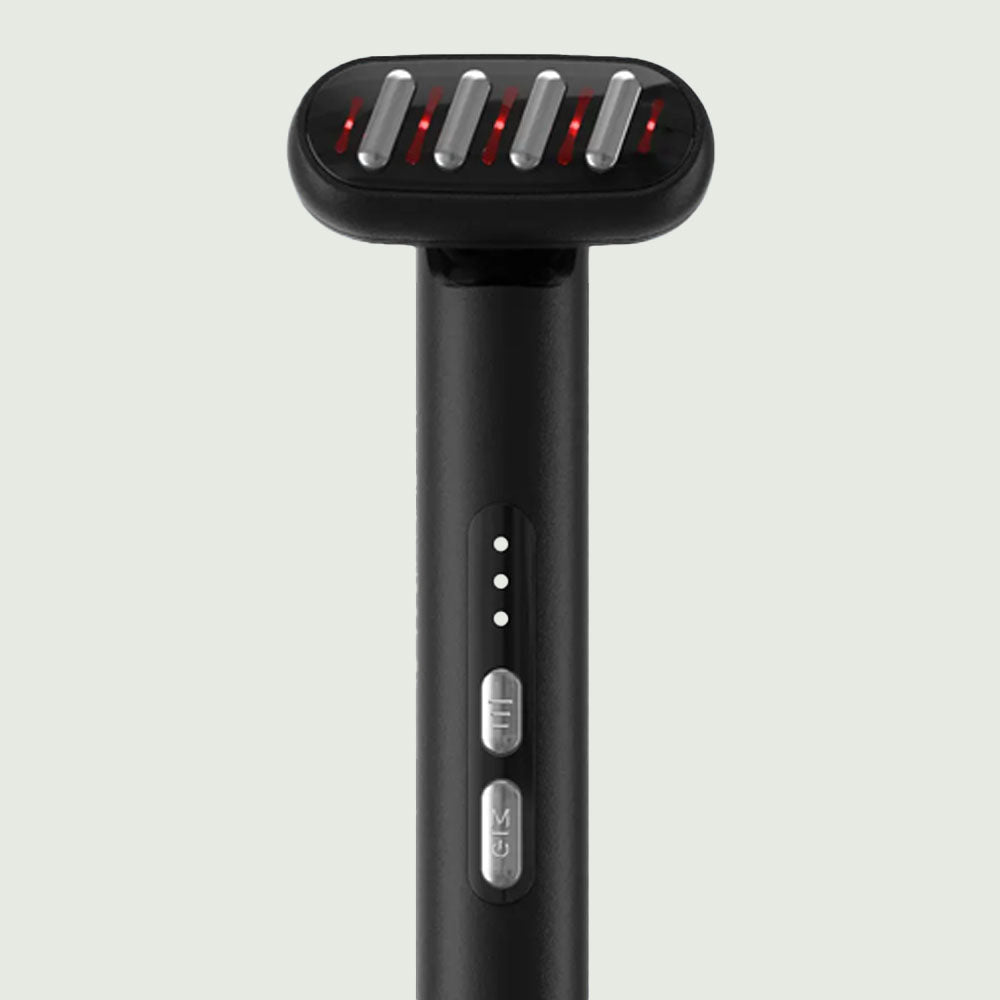 Close-up of the LED Light Therapy Wand head illuminated in red , with control buttons clearly visible on the handle, demonstrating dual light therapy function and easy operation.
