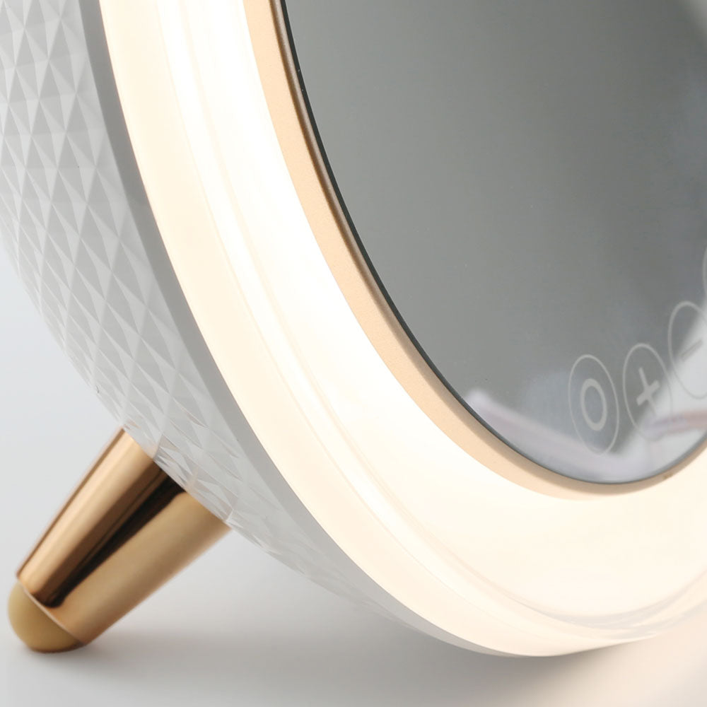 Zoomed-in view of LED Ring Light Bluetooth Mirror from re-nū Smart Beauty highlighting the illuminated LED ring and responsive touch control buttons for brightness adjustment and Bluetooth pairing