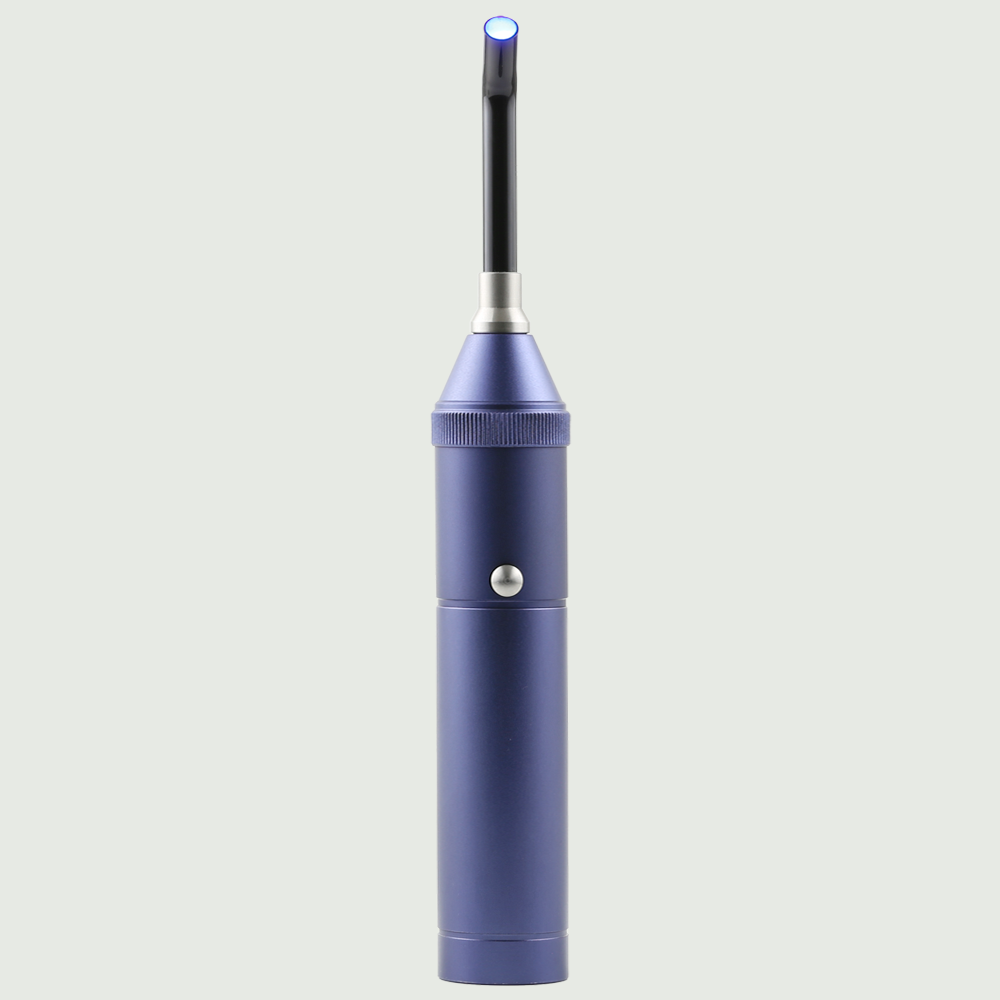 Standing position showing detachable fiber optic tip of the red light therapy Torch for precise, targeted skin treatment