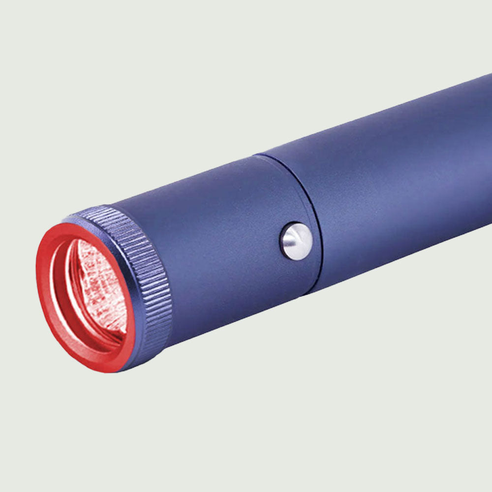 Close-up of Red Light Therapy Torch showing the precision fiber optic tip and sleek, compact design for targeted skin rejuvenation.