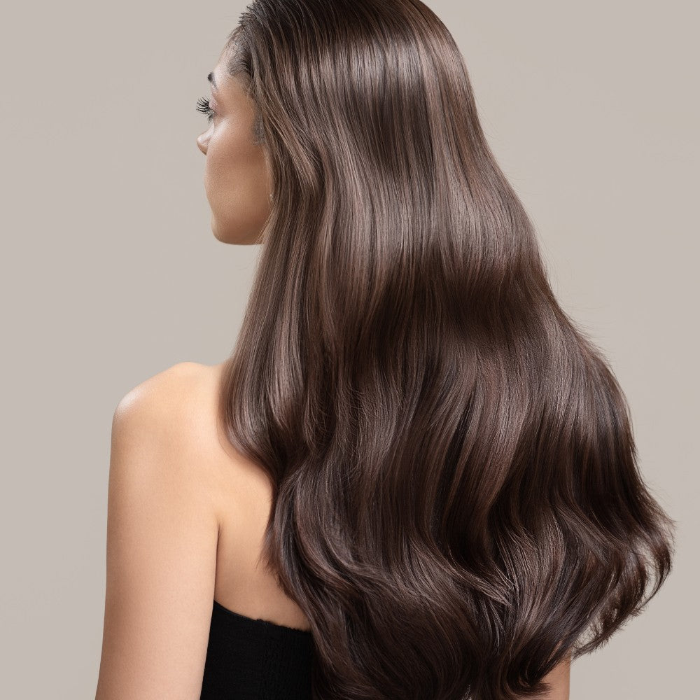 Close-up of thick, shiny, and healthy hair after consistent use of the Plasma Laser Hair Growth Comb, highlighting visible improvement in volume and scalp health