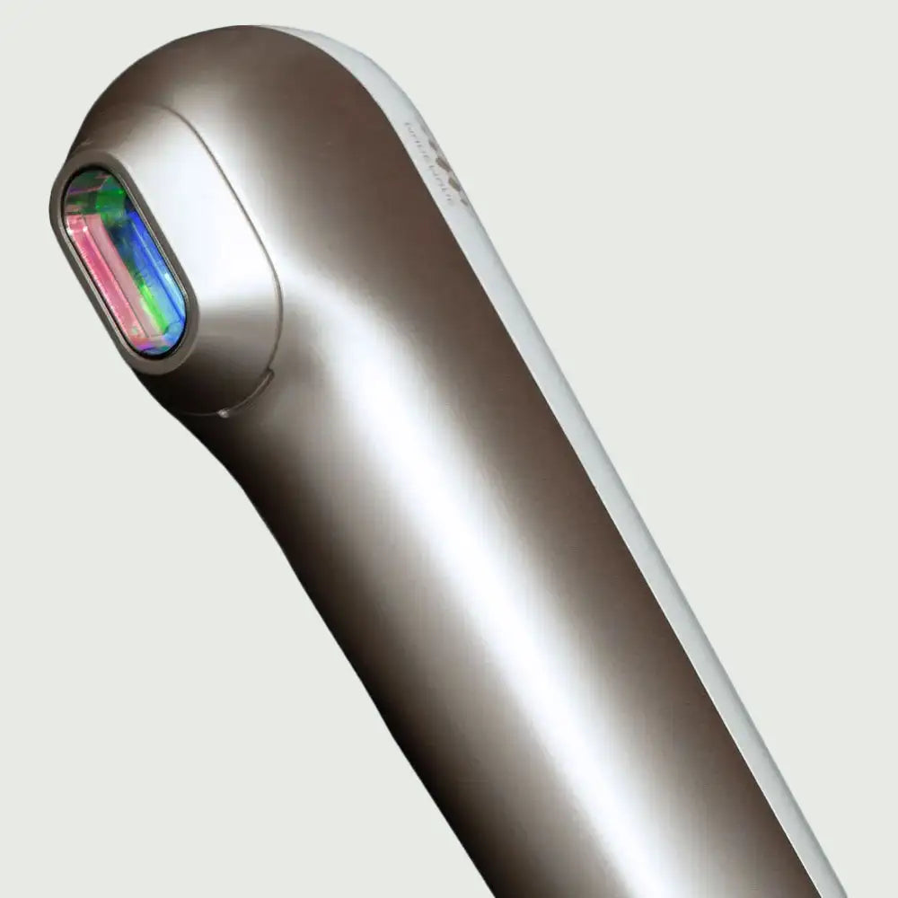 Close-up of the re-nū RapidFlash interchangeable light heads, each glowing with distinct tones for targeted hair removal, skin whitening, and rejuvenation treatments.