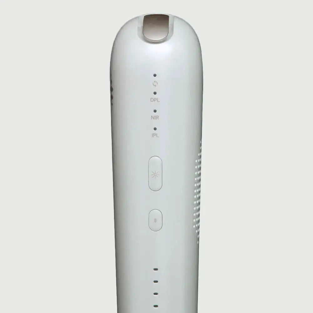 Front-facing close-up of the re-nū RapidFlash Laser Hair Remover head, displaying the integrated IPL, DPL, and NIR light window for advanced multi-skin treatments.