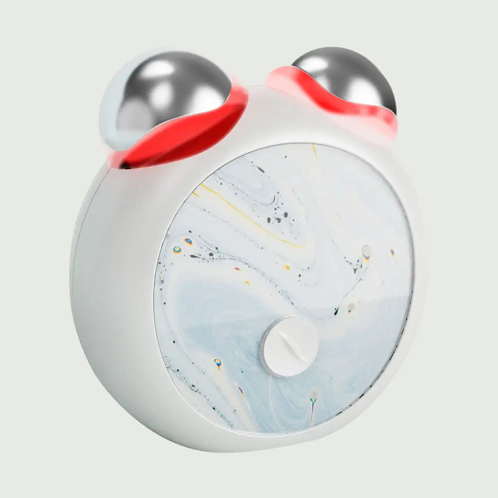 Side angle view of the compact LED Facial Toning Massager, front view showing the smooth, ergonomic design with visible LED light High Frequency Microcurrent EMS massage rollers.