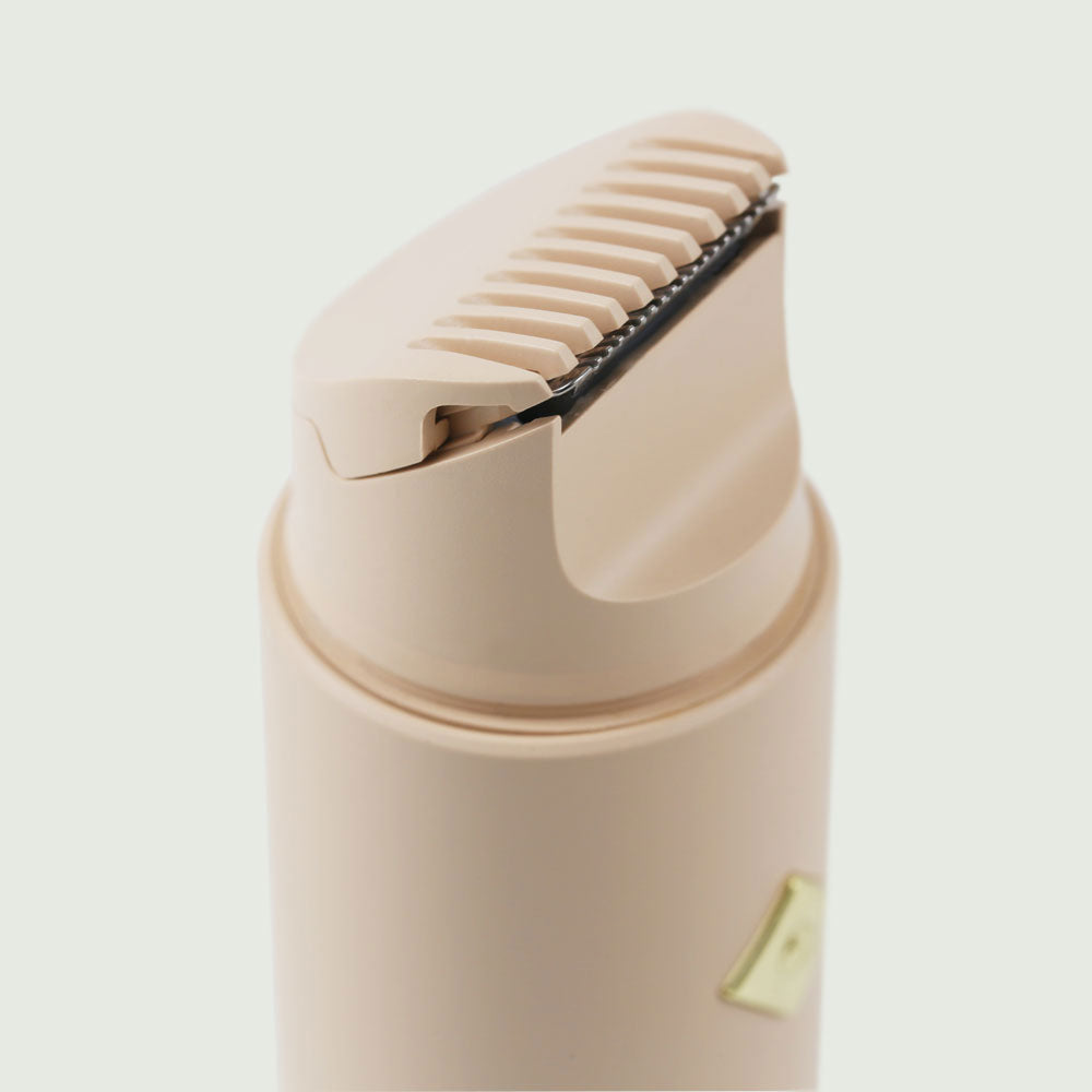 Close-up View of the Double-Headed Personal Grooming Trimmer head, highlighting the Hypoallergenic stainless steel blades for precision and comfort.