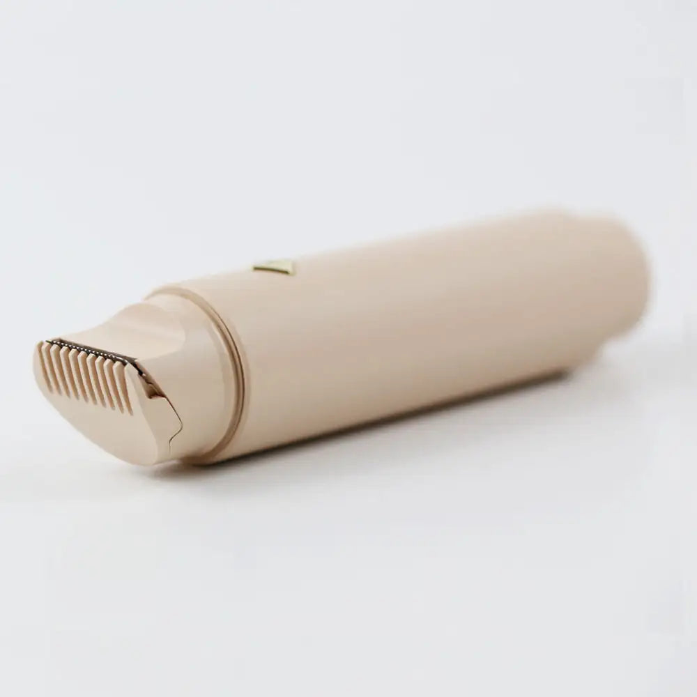 A flat image of the Double-Headed Personal Grooming Trimmer, highlighting it's stainless steel sculpting clipper head.