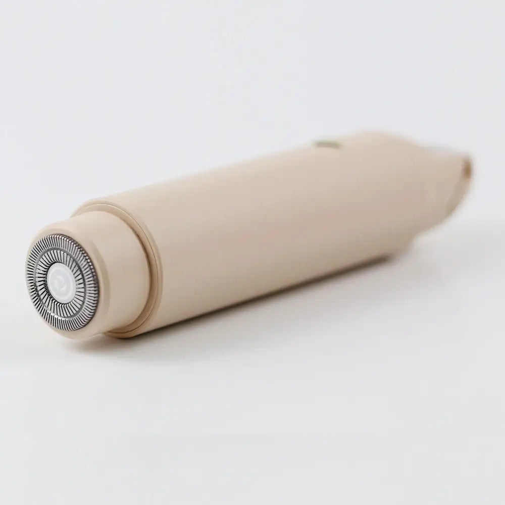 A flat image of the Double-Headed Personal Grooming Trimmer, highlighting it's sleek hypoallergenic floating shaving head.