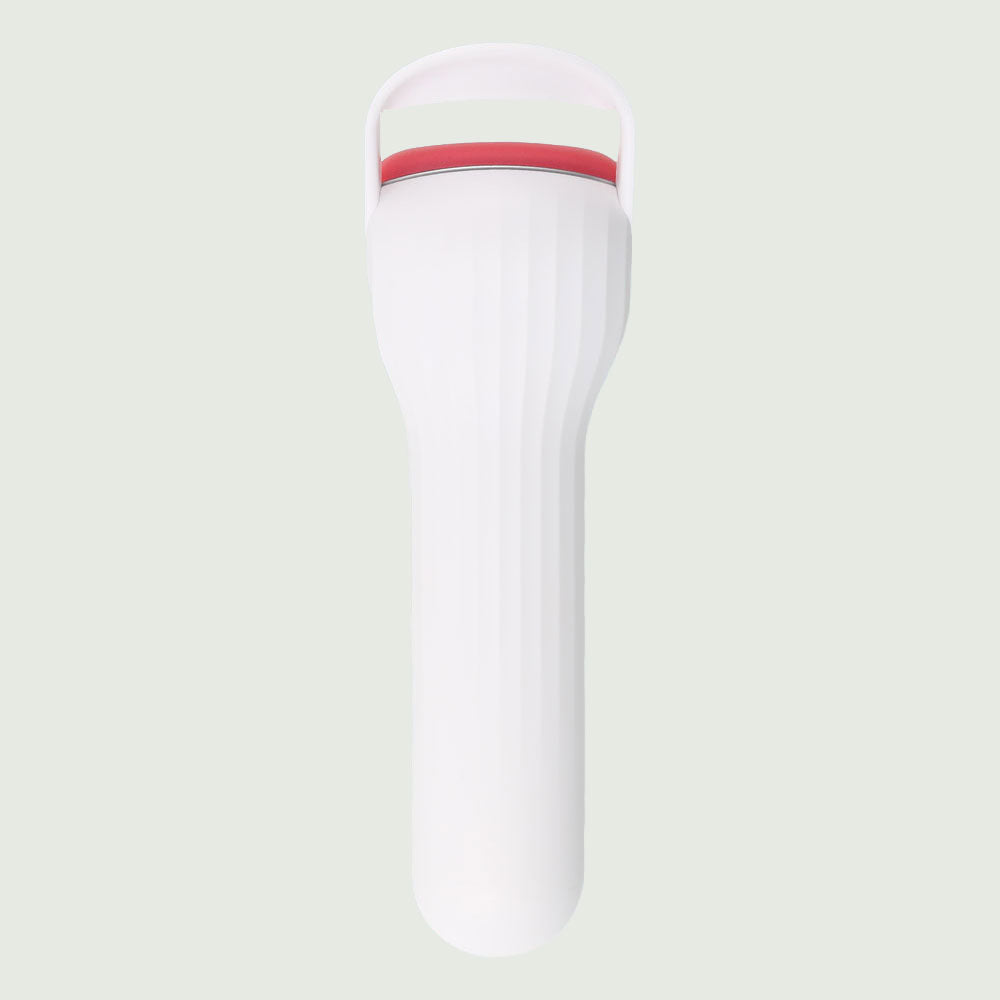 Back view of the re-nū Smart Beauty Heated Eyelash Curler, highlighting the heated comb designed for effective and long-lasting curls.
