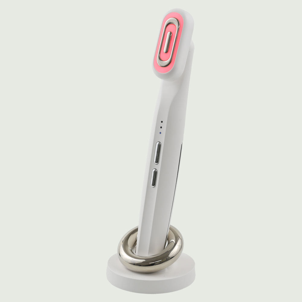 GlowUp 360° LED light therapy wand with ergonomic design and charging base, ideal for facial skin rejuvenation and anti-aging treatment.