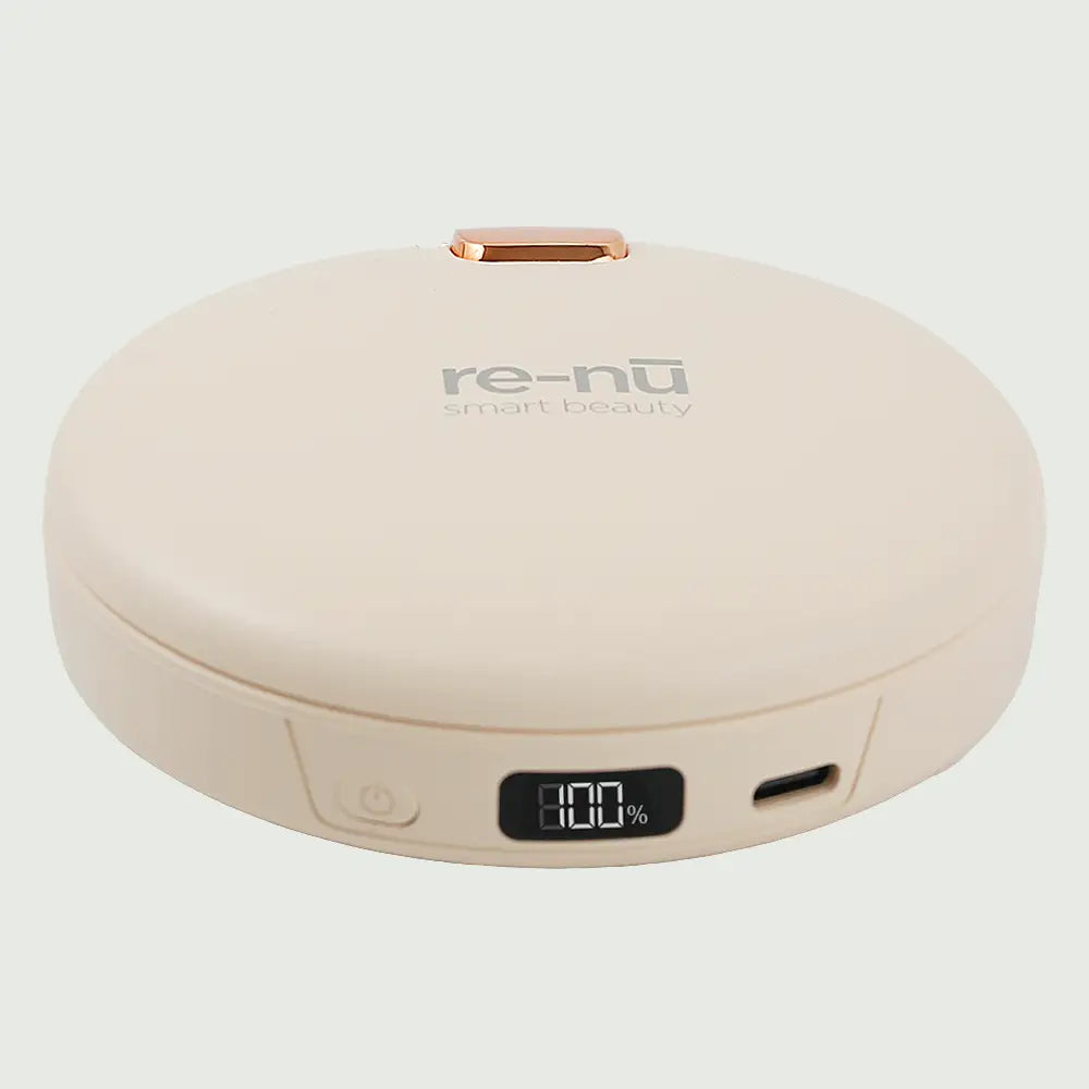 Beige re-nū LED Mirror + Power Bank with Digital Display shown closed on a flat surface