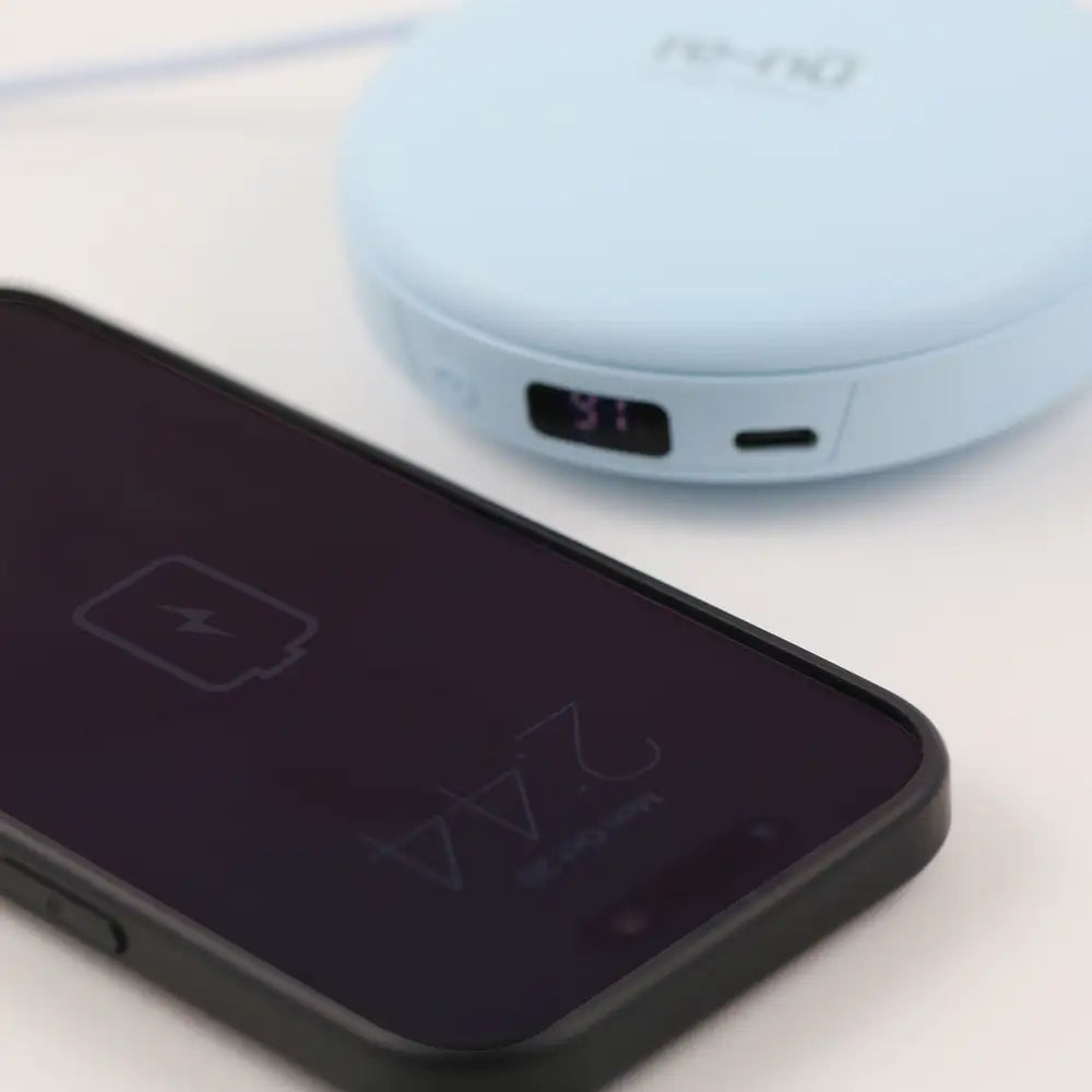 re-nū LED Mirror + Power Bank charging a smartphone while closed