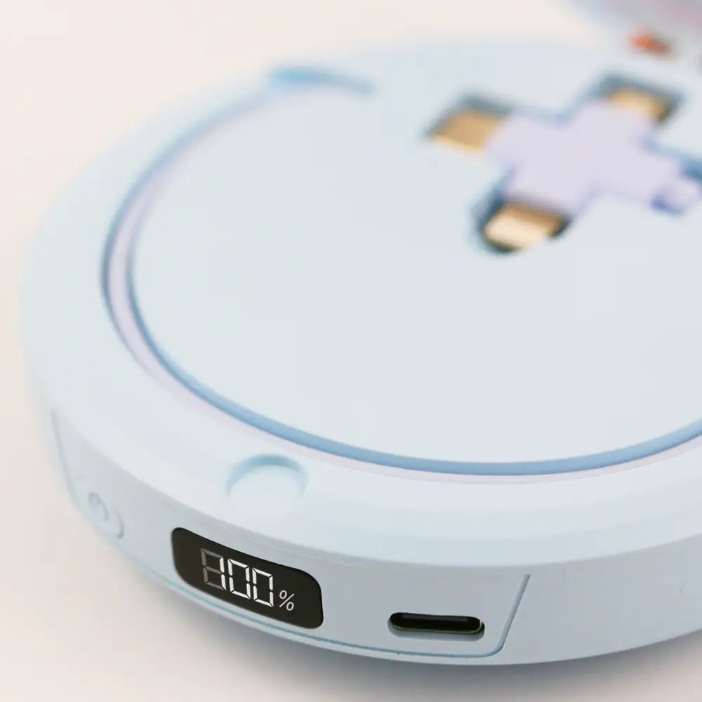 Close-up of re-nū LED Mirror + Power Bank showing 3-in-1 charging cable and digital display with battery percentage indicator