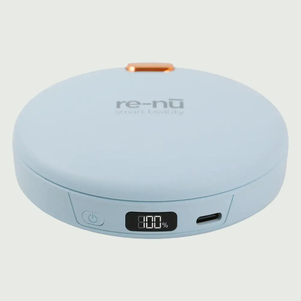 Blue re-nū LED Mirror + Power Bank with Digital Display shown closed on a flat surface.