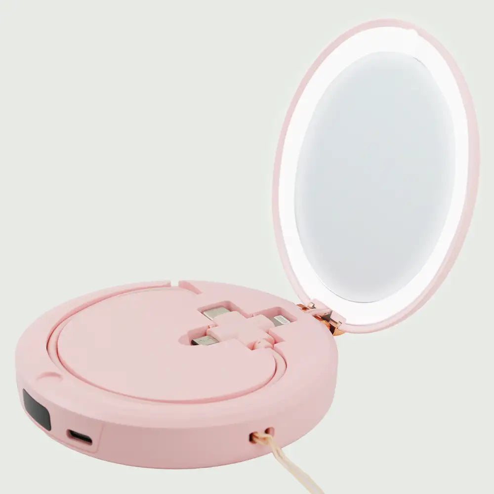 Pink re-nū LED Mirror + Power Bank open with built-in LED light illuminated
