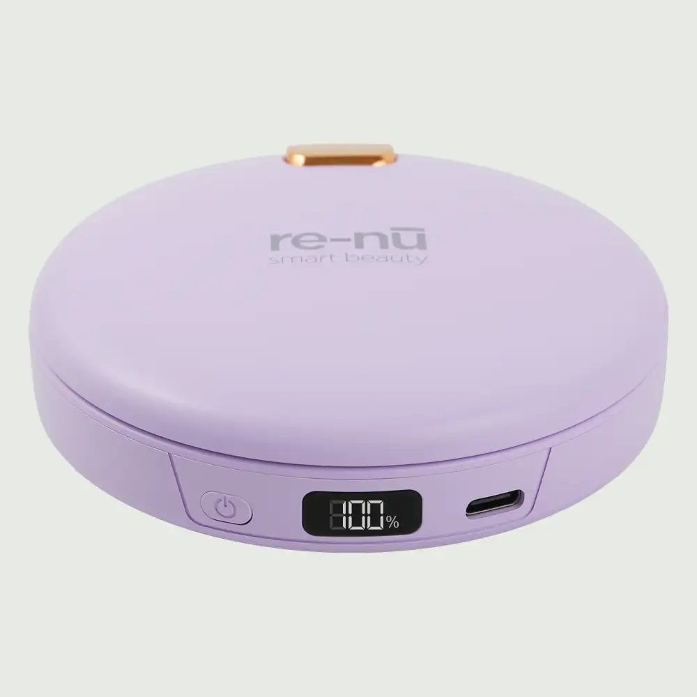 Purple re-nū LED Mirror + Power Bank with Digital Display shown closed on a flat surface