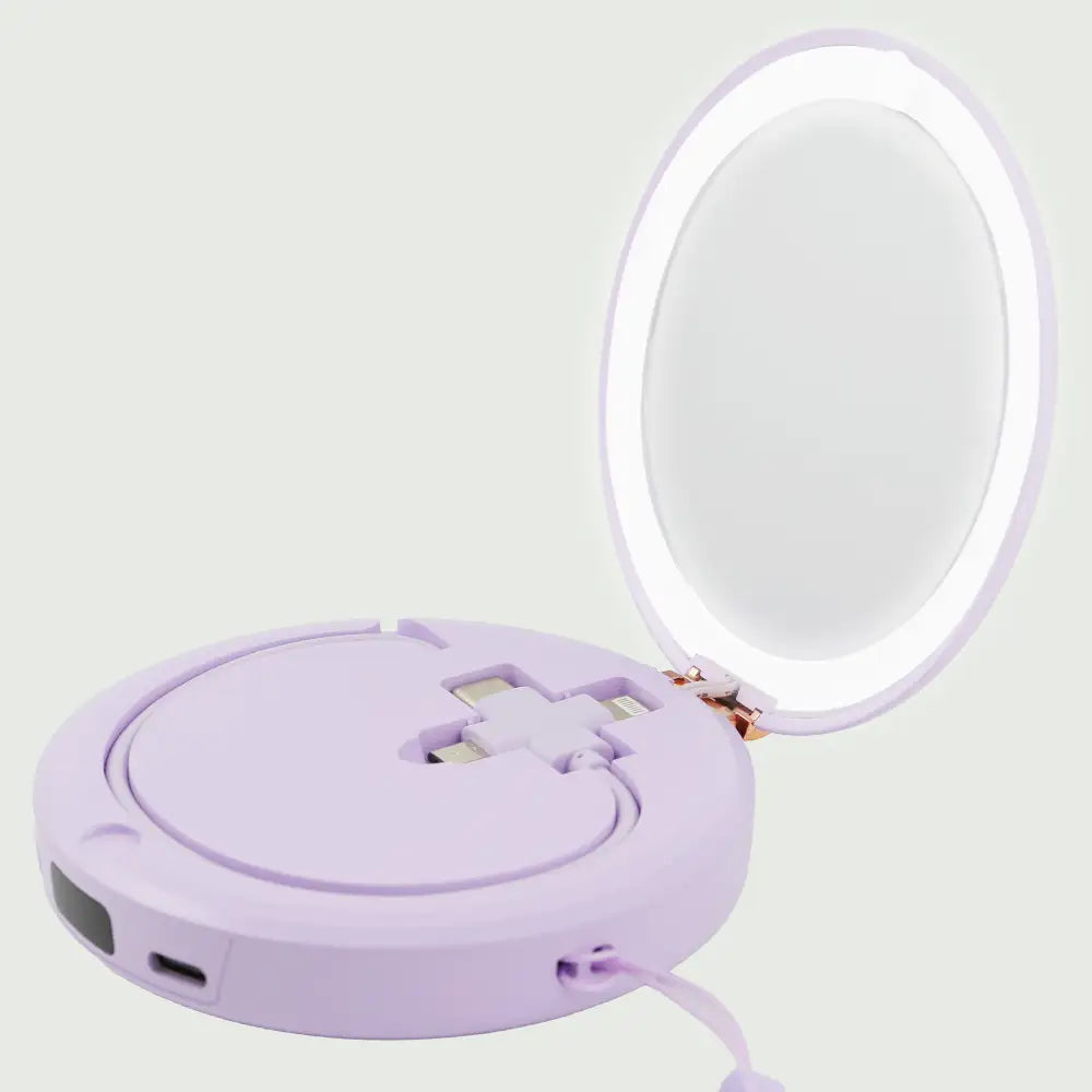 Purple re-nū LED Mirror + Power Bank open with built-in LED light illuminated