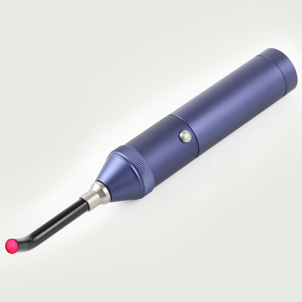 Side view of Red Light Therapy Torch laying flat with fiber optic tip , highlighting sleek design and targeted treatment tip.