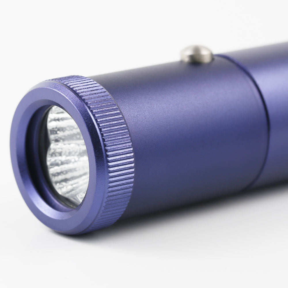 Close-up of Red Light Therapy Torch highlighting its sleek, compact design