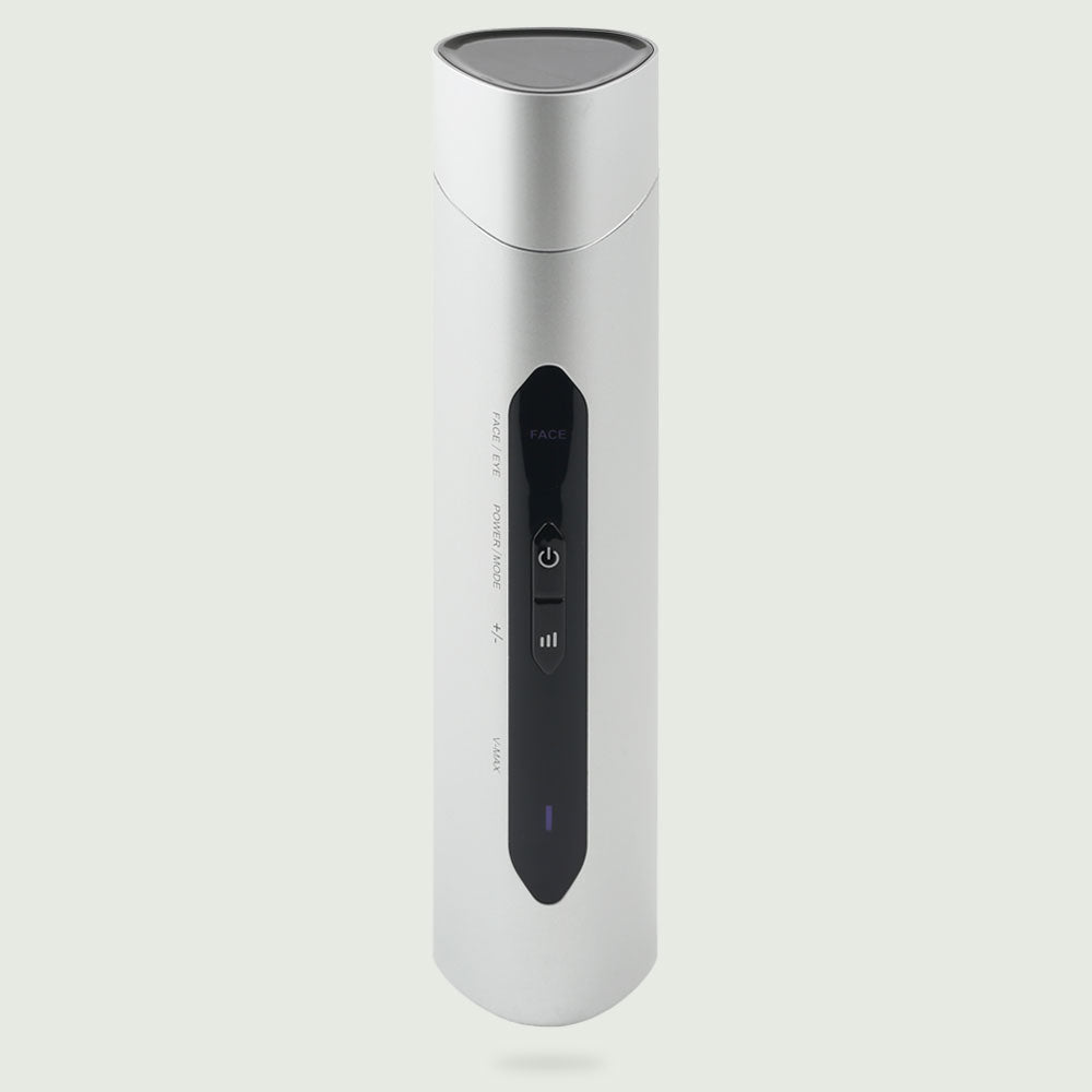 Full-length image of the re-nū RF LED Microcurrent Face-Lifting Device, displaying its streamlined design from treatment head to base, with visible LED panel and ergonomic curves