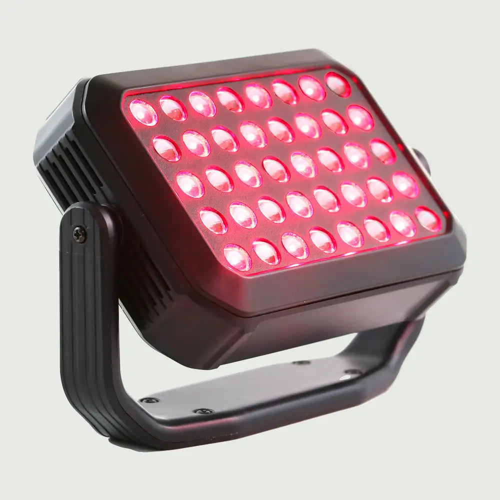 Angled side view of the UltraCompact LED Red Light Therapy Panel tilted to the side on its stand, emphasizing its slim, portable design and super bright LED lenses.