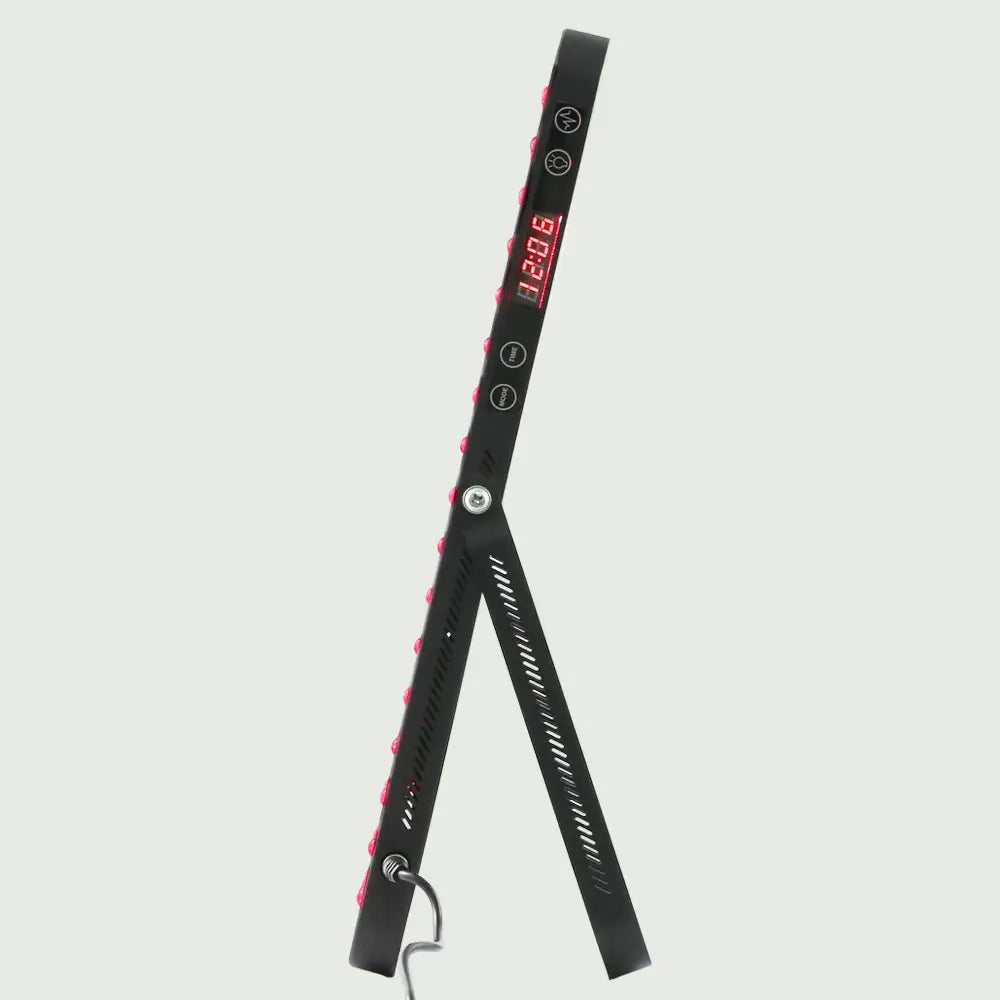 Side view of the LED Red Light Therapy Panel Elite – UltraThin on its stand, highlighting its slim profile, built-in digital display with controls, and side power cord port.