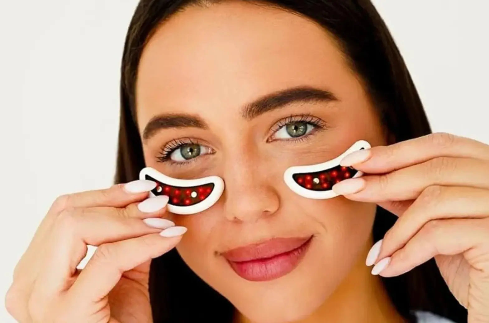 Wireless red light and EMS microcurrent pads for under-eye rejuvenation, wrinkle reduction, and puffiness relief.