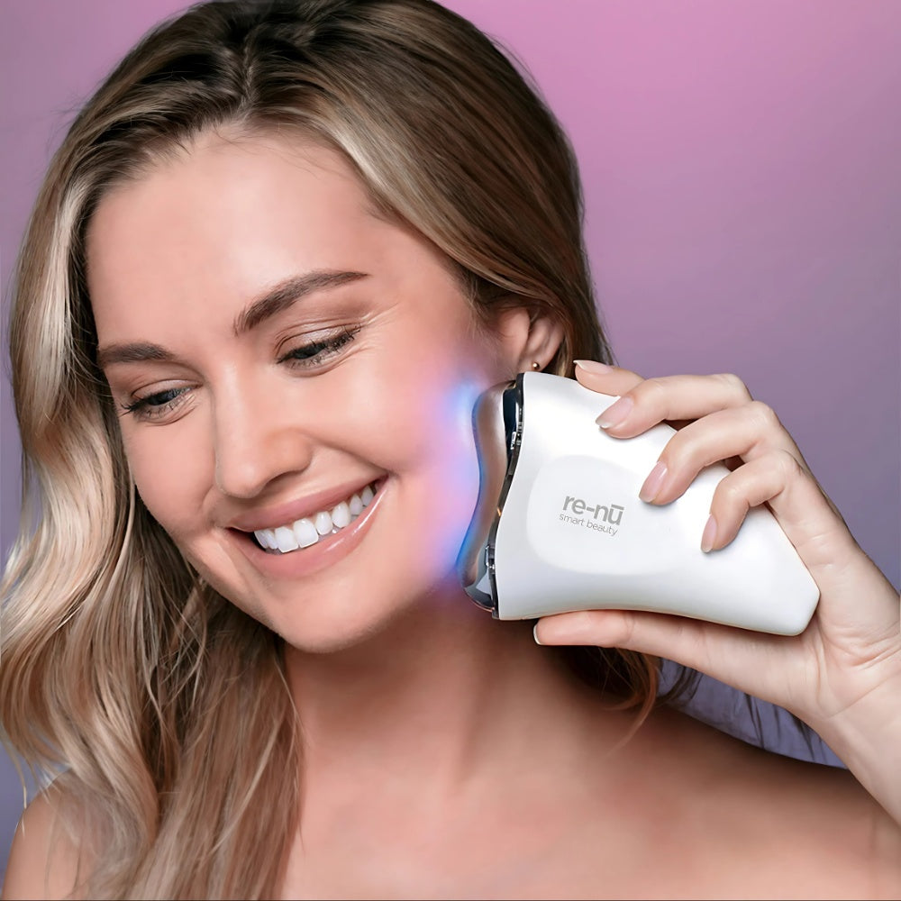 A woman with a warm smile holds an electric device, embodying positivity and connection with modern technology.