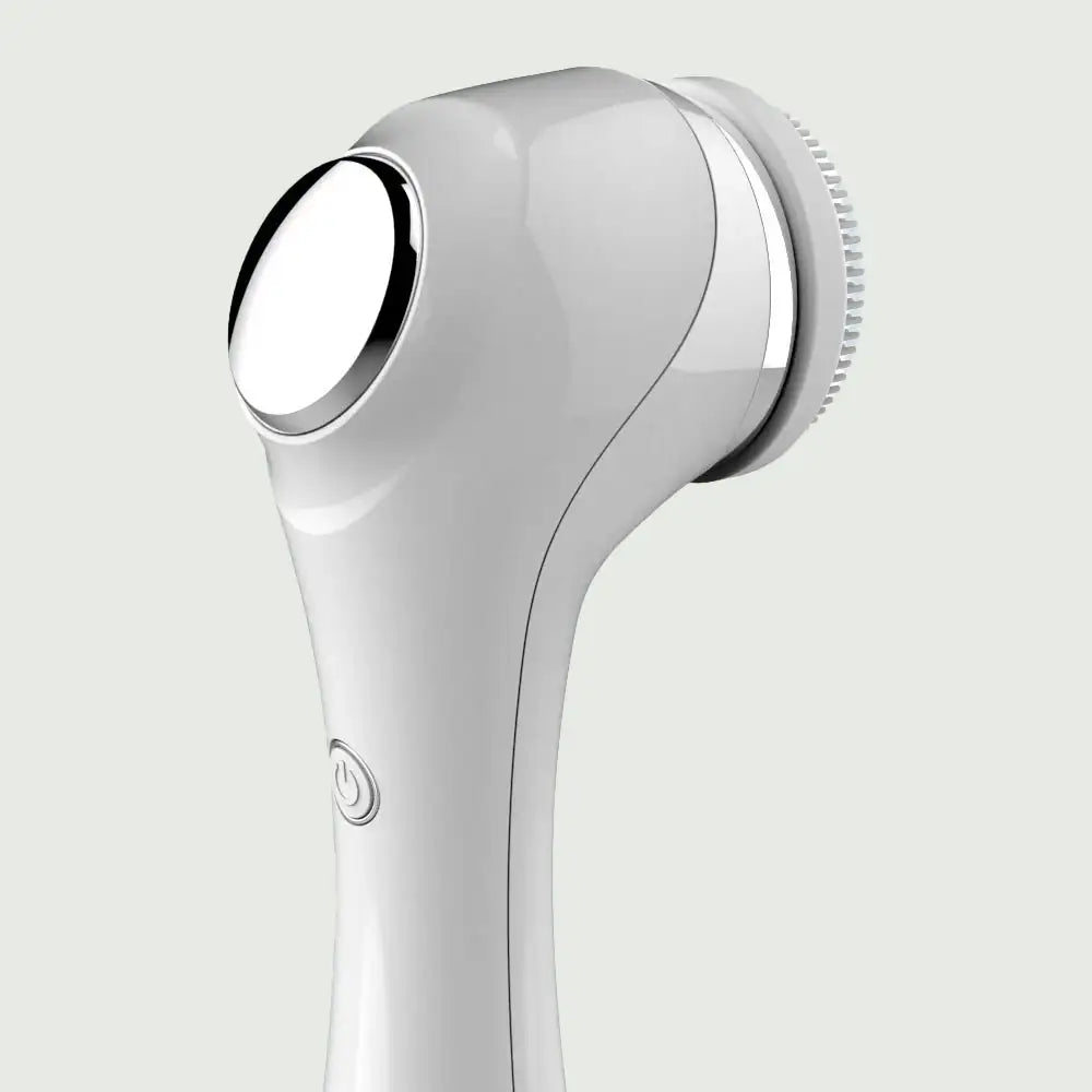 Close-up of PureSpin Facial Cleansing Brush with EMS vibration technology