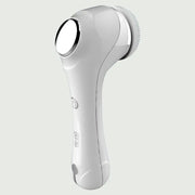 Back view of PureSpin Facial Cleansing Brush with EMS showing curved design and control panel