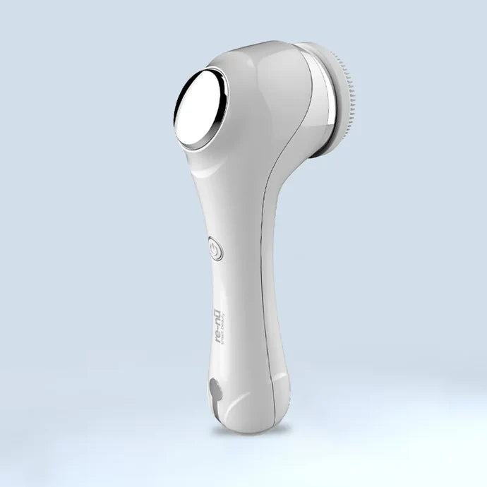 Back view of PureSpin Facial Cleansing Brush with EMS showing curved design and control panel