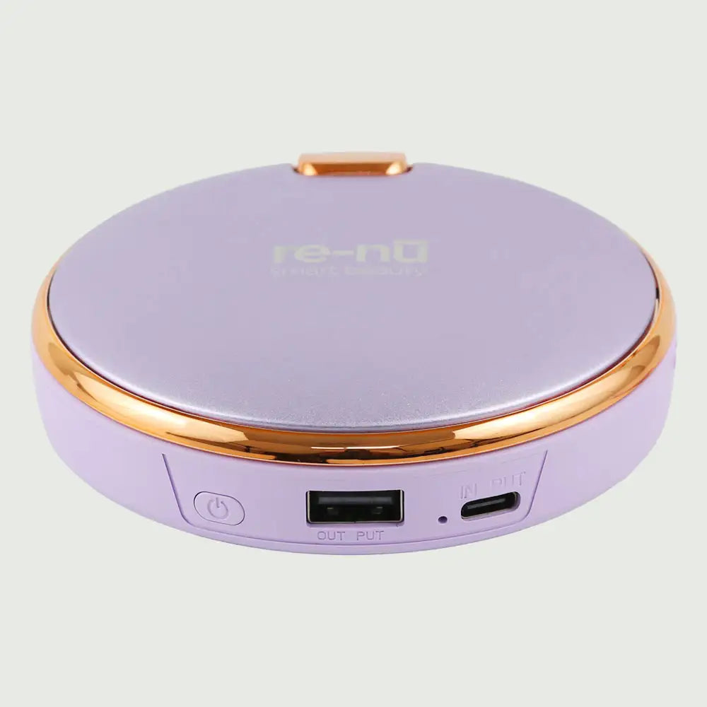 re-nū Smart Beauty 3-in-1 Rechargeable Hand Warmer & Power Bank – compact aluminum design in Purple finish.