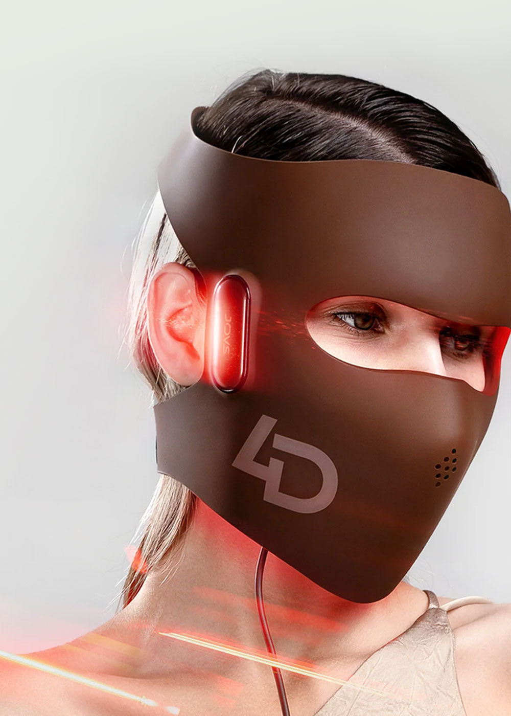 Close-up view of a woman wearing the 4D laser light therapy mask, the world's first and ONLY FDA-Cleared laser light therapy mask. Its advanced technology reaches deep layers of collagen, significantly reducing wrinkles.