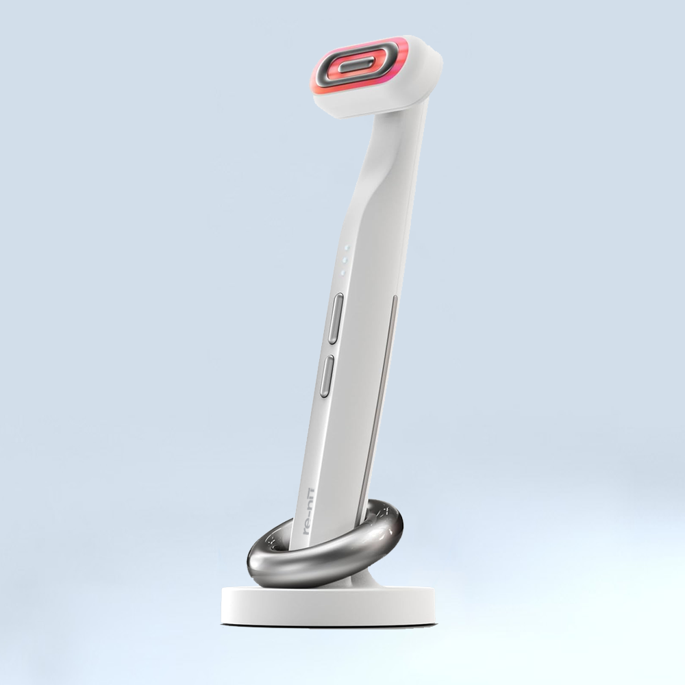 A white and red electric toothbrush featuring a Mask LED Light Therapy for enhanced oral care.