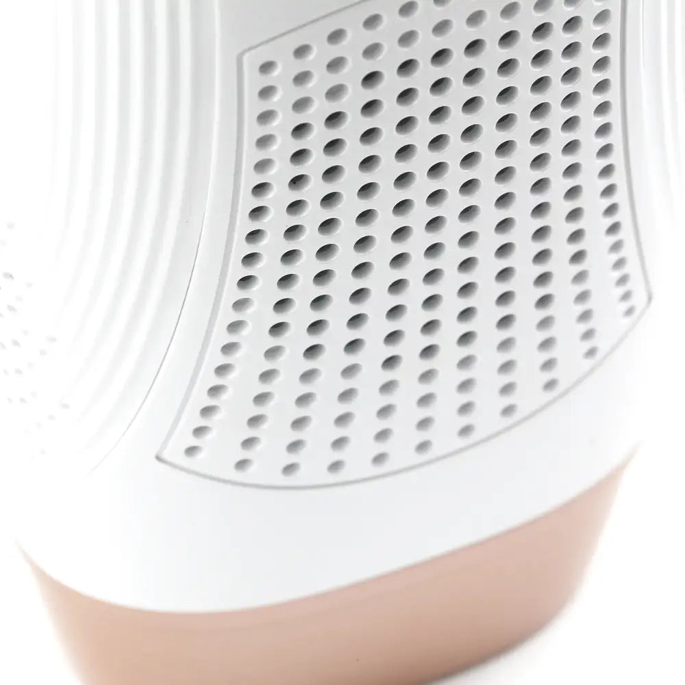 Close-up of the ergonomic, contoured design and cooling vents on the IPL Hair Removal Device