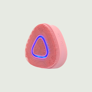PurePulse Pro Sonic Cleansing Brush in pink featuring a blue LED light,  soft silicone bristles and sleek ergonomic design for facial cleansing