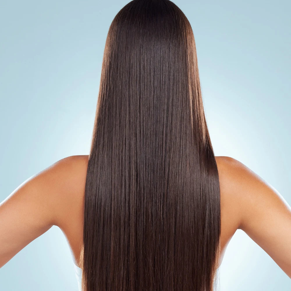 Smooth, voluminous hair with a natural shine, captured after treatment with the Plasma Laser Hair Growth Comb, reflecting improved strength and density