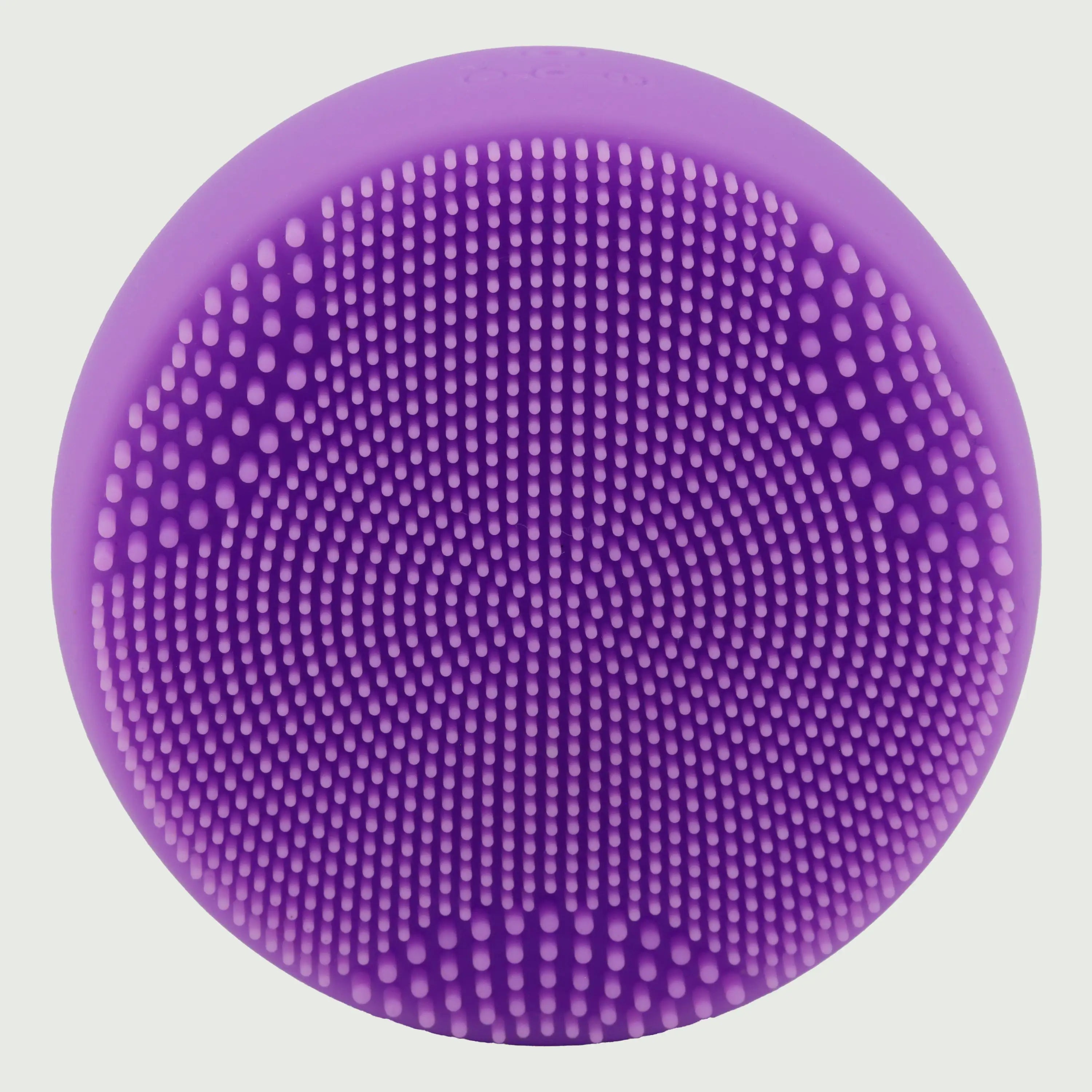 PurePulse Pro Plus Sonic Cleansing Brush shown in forward facing view highlighting soft silicone bristle surface, ergonomic contours, premium finish, and compact profile
