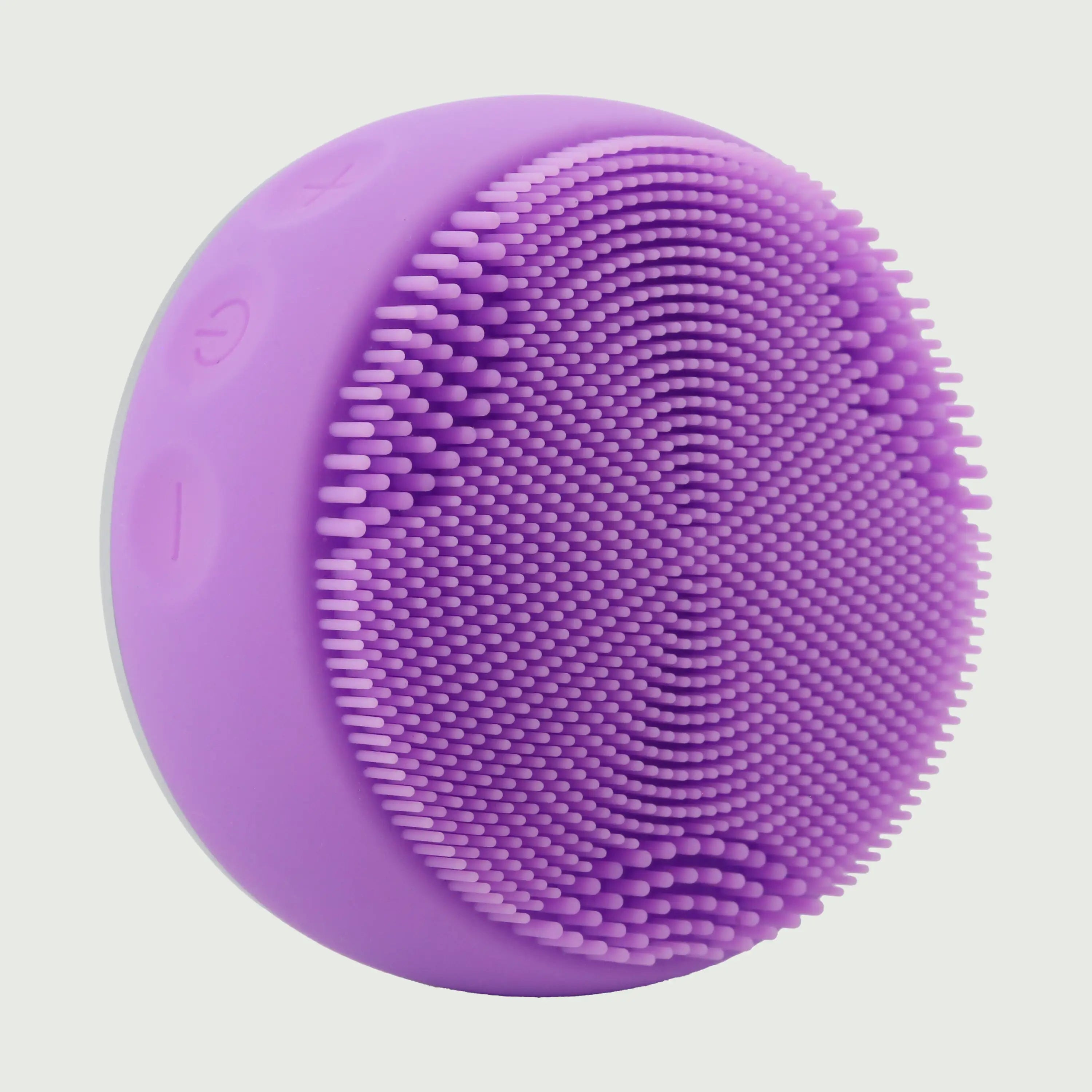 PurePulse Pro Plus Sonic Cleansing Brush shown in 3/4 view highlighting soft silicone bristle surface, ergonomic contours, premium finish, and compact profile