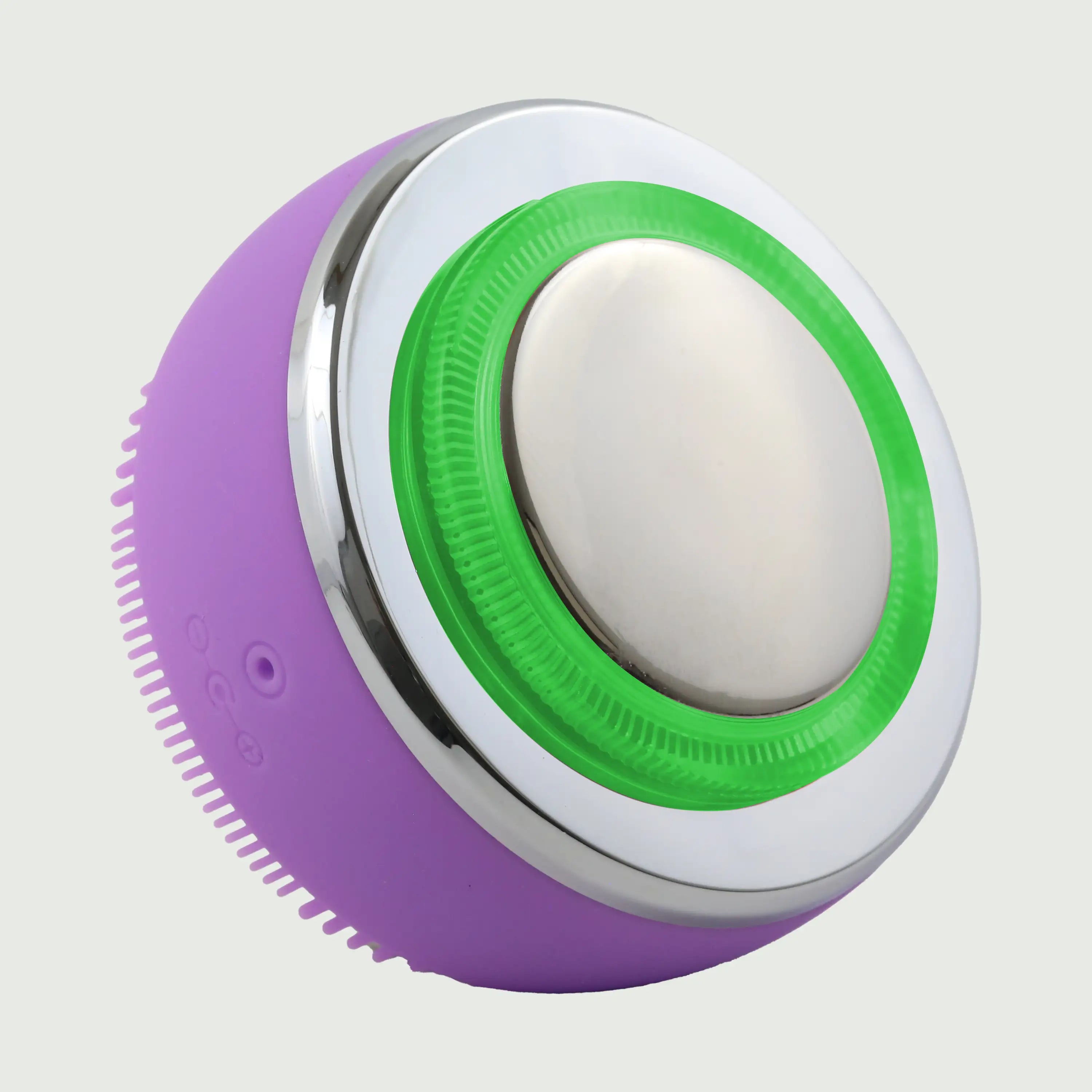 PurePulse Pro Plus Sonic Cleansing Brush shown in 3/4 view with green LED illumination, polished chrome EMS head, soft silicone bristles, ergonomic handle, and reflective premium finish